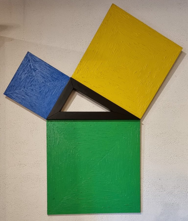 Composition géométrique colorée avec des formes en bleu, jaune, noir et vert.